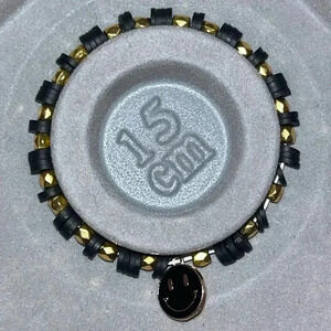 Black & gold smiley face bracelet